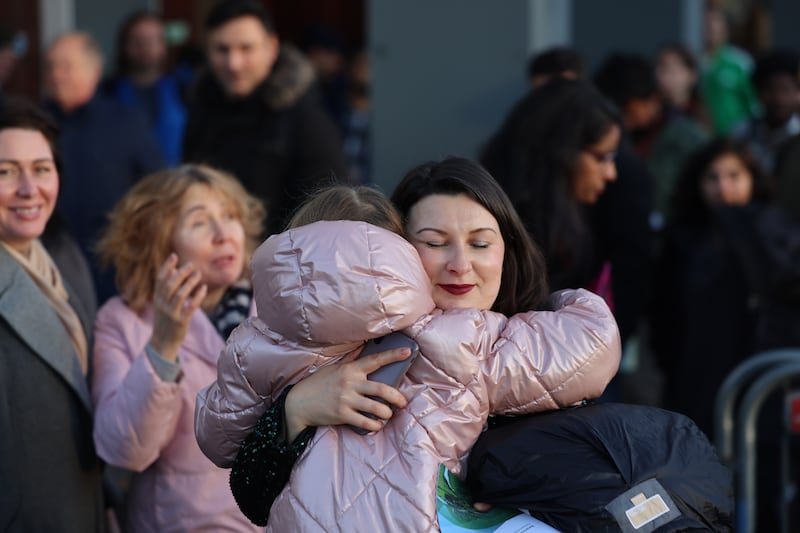Katya Gubanova, born in Russia, and living in Dublin, gets a hug from her daughter Ella (7)