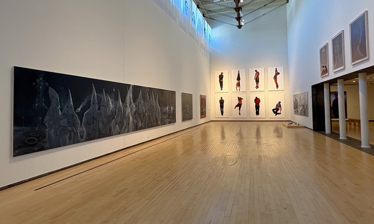 L to R: Vincent Valdez, "The Beginning is Near, An American Trilogy, Ch. 1: The City II," 2016: "The Strangest Fruit," 2013.  Installed at Mass MOCA in "Vincent Valdez: Just a Dream ..." until April 2026. (Murray Whyte/Globe Staff)00moca