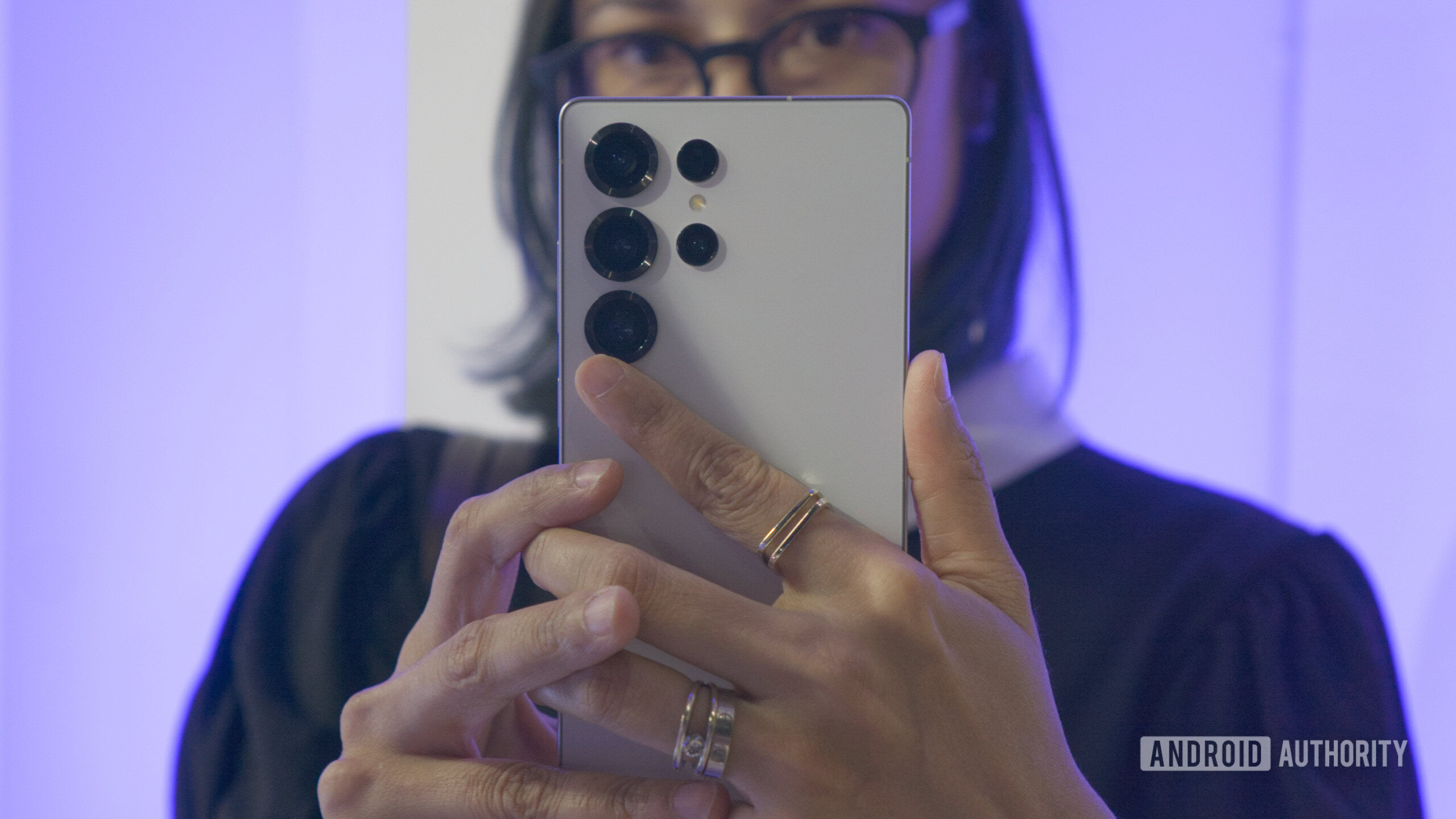 Samsung Galaxy S25 Ultra in hand showing cameras Samsung Galaxy S25 Ultra in hand showing cameras