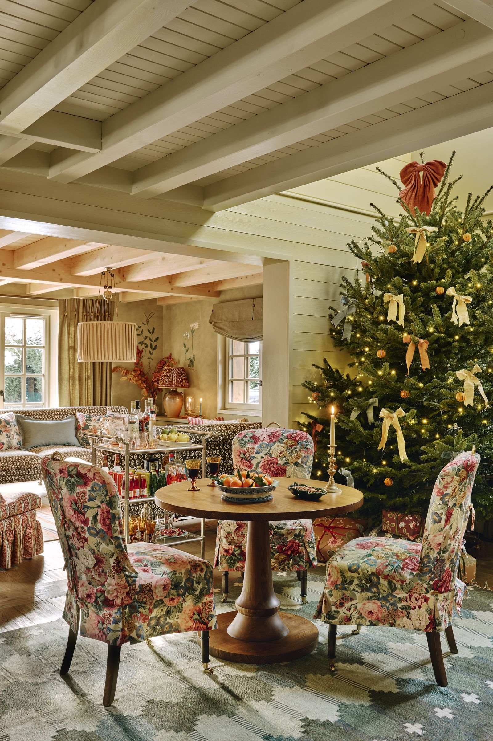 Image may contain Christmas Christmas Decorations Festival Chair Furniture Christmas Tree and Table