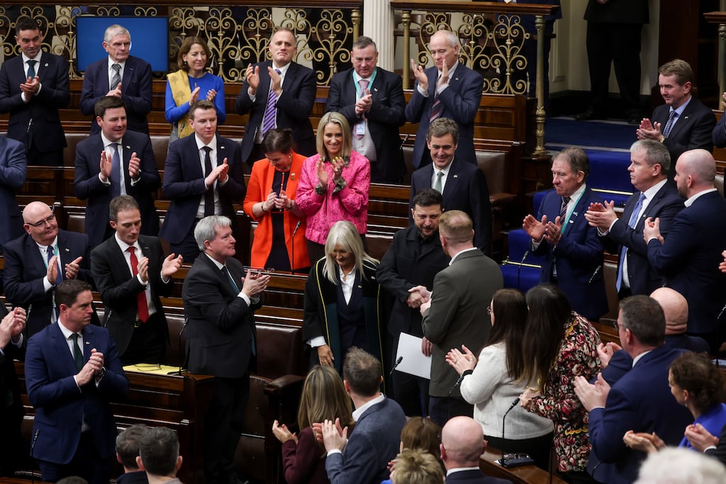 Ukrainian President Volodymyr Zelenskiy (centre) receiving a standing ovation as he arrives into the Dáil chamber on Tuesday afternoon during his visit to Ireland. Photograph: Tony Maxwell/Maxwells