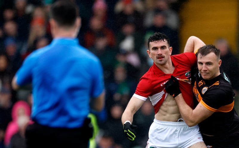 Dingle’s Mark O'Connor and Michael O'Donnell of Austin Stacks during the Kerry senior football final in October. Photograph: James Crombie/Inpho