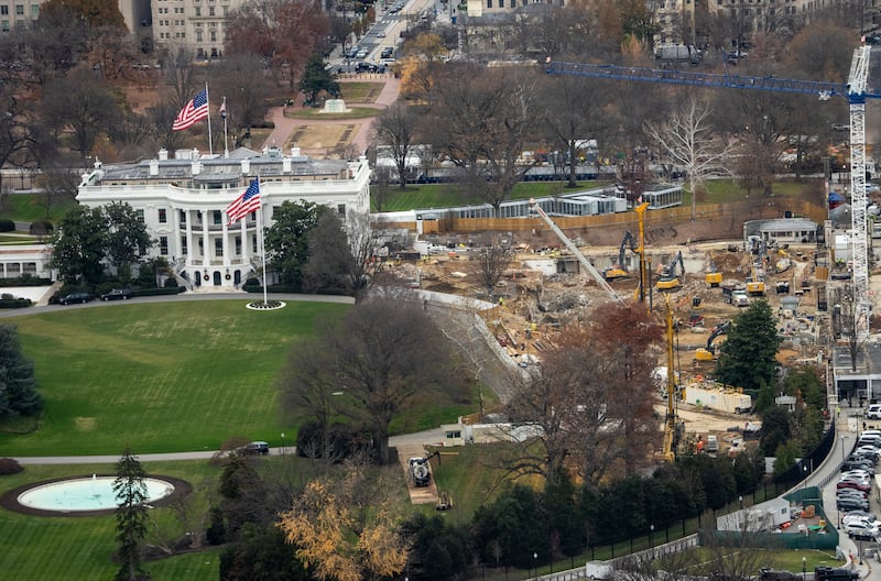 The White House and a construction site where the East Wing once stood on December 8th. Photograph: Doug Mills/The New York Times
                     