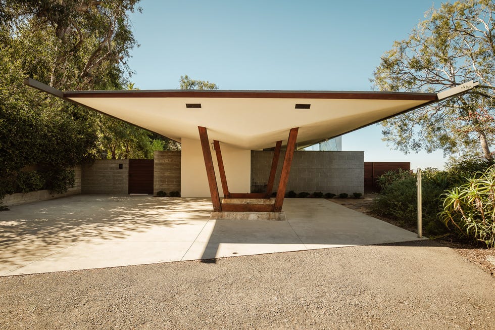 Contemporary architectural structure with a distinctive overhanging roof