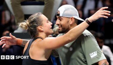 Aryna Sabalenka and Nick Kyrgios hug at the net