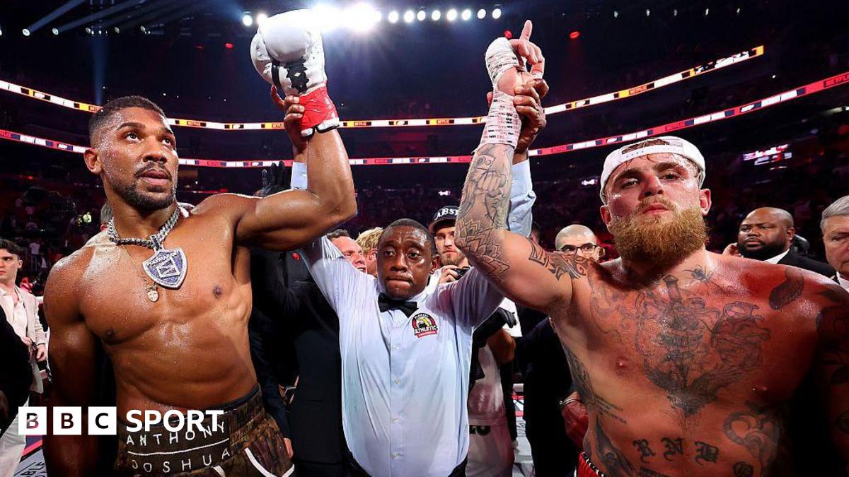 Anthony Joshua and Jake Paul have their hand raised