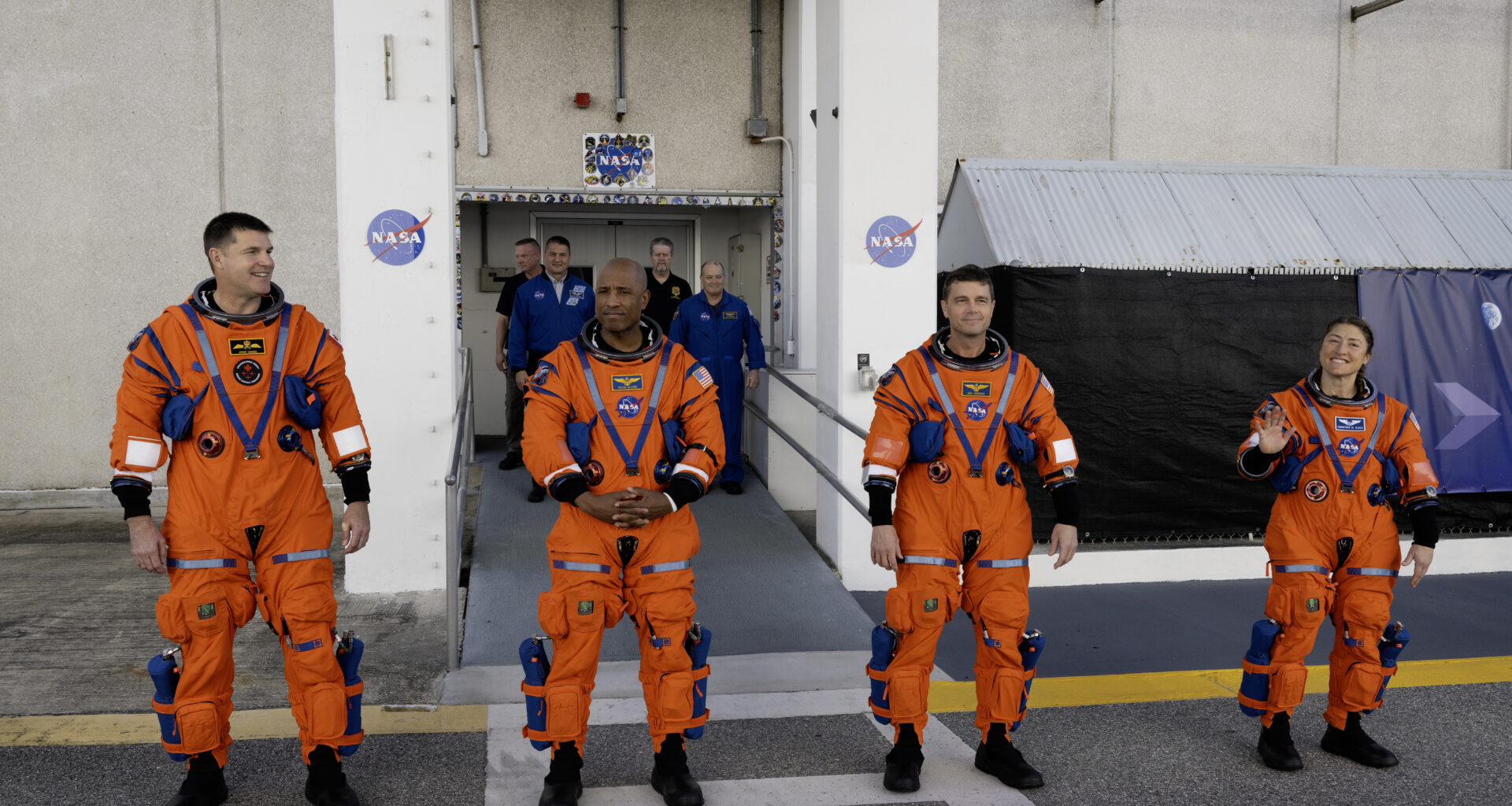 Crew depart the Neil A. Armstrong Operations and Checkout Building to travel to the Vehicle Assembly Building to board their Orion spacecraft atop NASA’s SLS (Space Launch System) rocket as part of the Artemis II Countdown Demonstration Test, December 20, 2025
