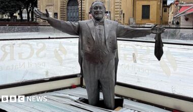 The statue of Pavarotti surrounded by the ice rink