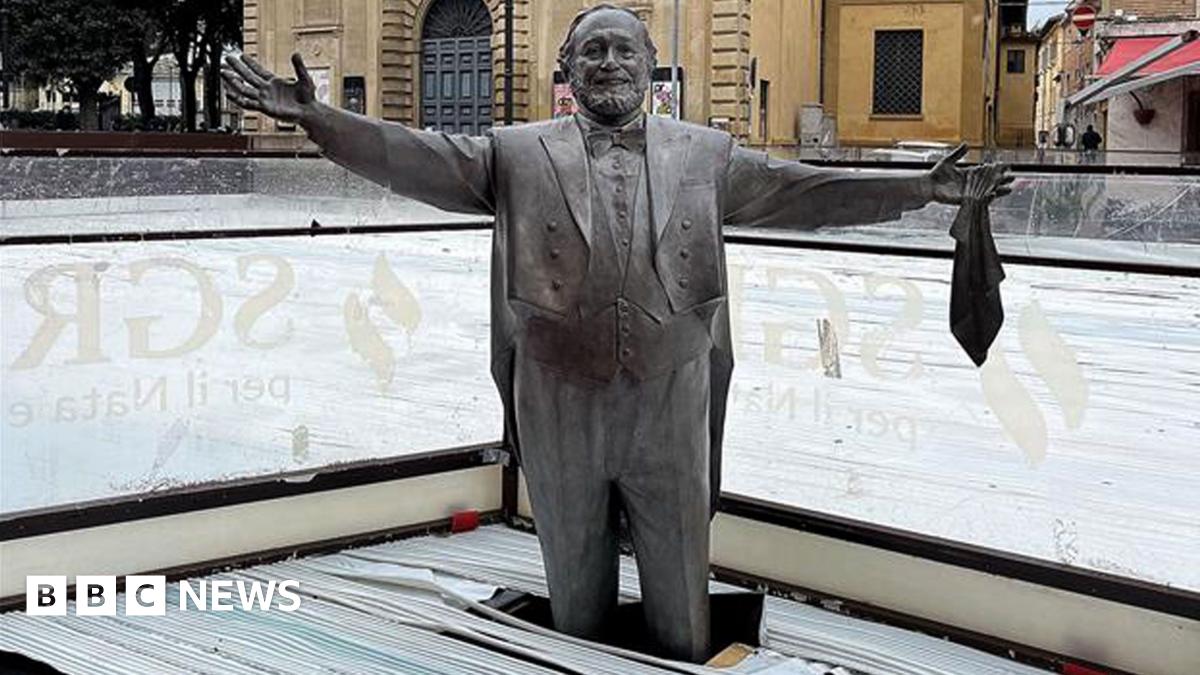 The statue of Pavarotti surrounded by the ice rink