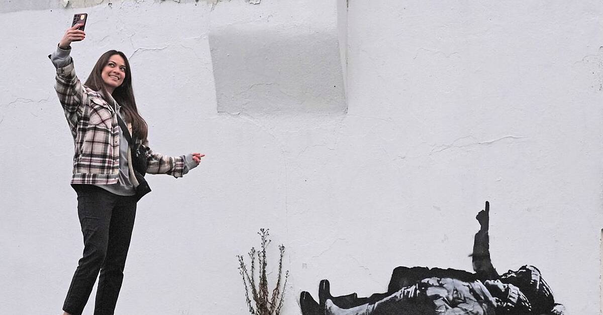 Banksy claims Bayswater artwork that shows two figures lying down