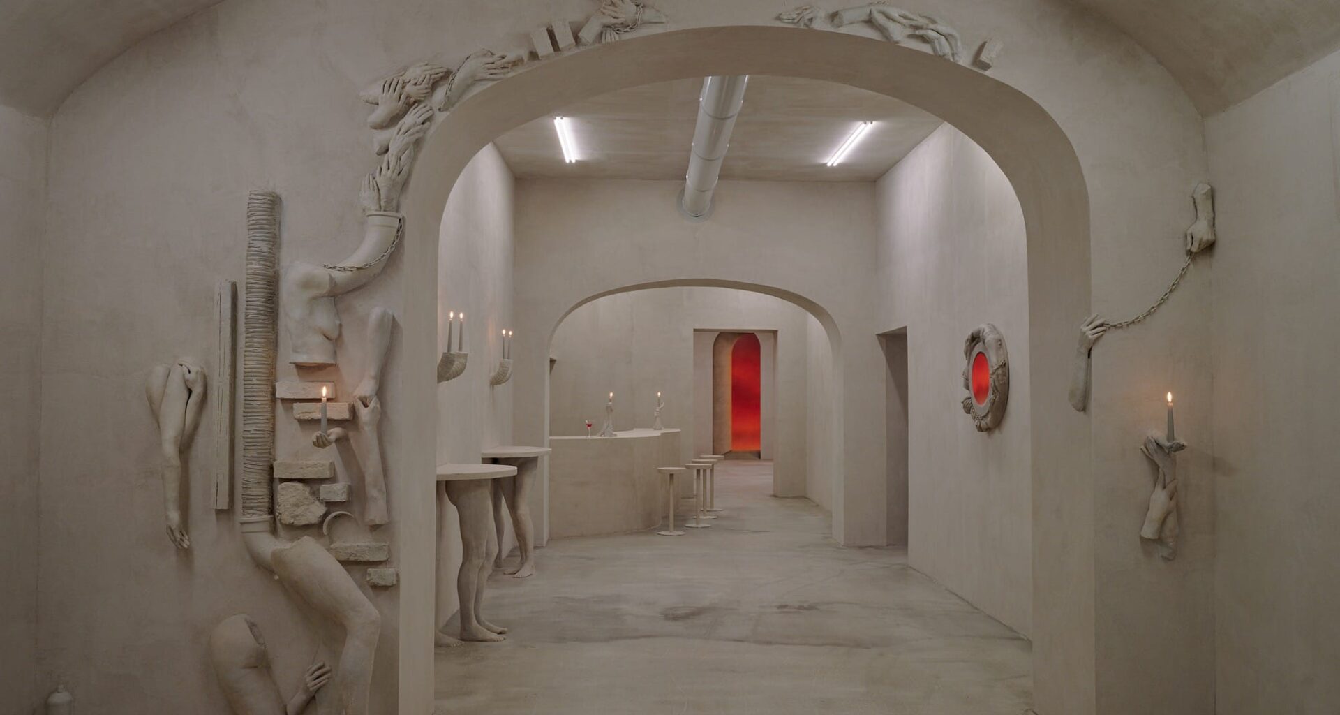 An art installation by Clementine Keith-Roach and Christopher Page that doubles as a bar, with furnishings and decor made of plaster-cast hands