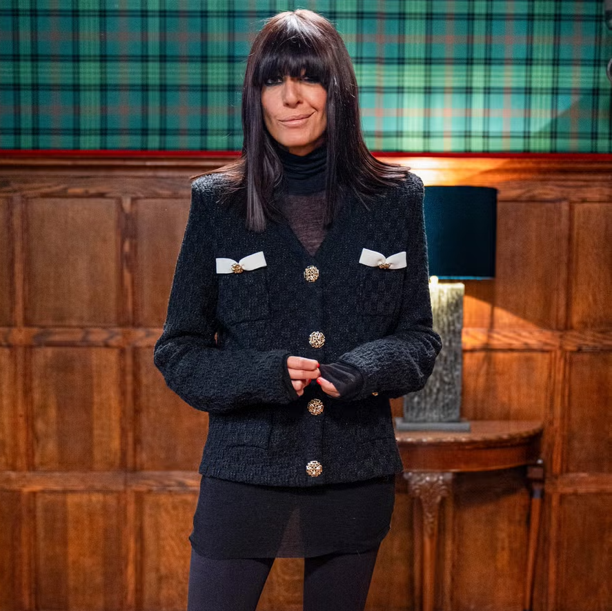claudia winkleman traitors polo neck