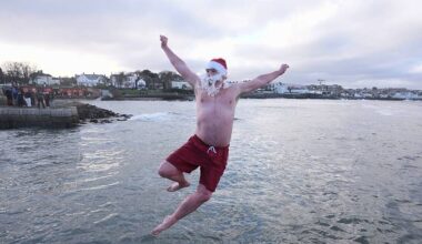 Crowds brave chilly temperatures for Christmas Day swim