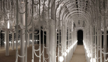 cloud-like white canopy emerges from abu dhabi’s arid landscape
