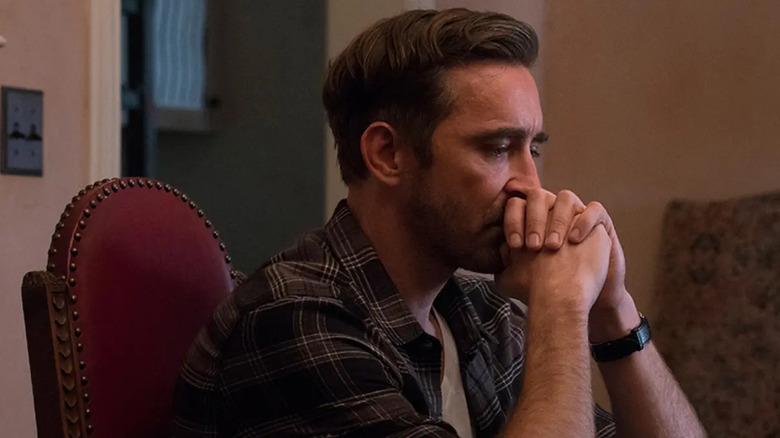 An emotional Joe MacMillan (Lee Pace) sits pensively in Halt and Catch Fire