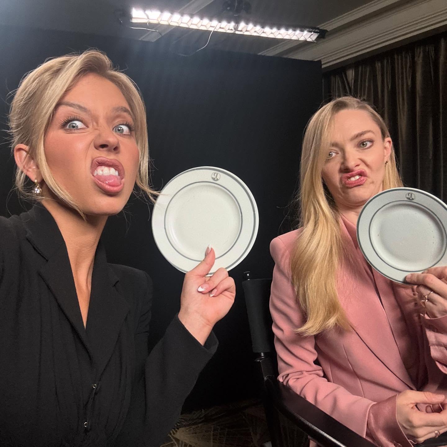 Sydney Sweeney (left) and Amanda Seyfried have some comic relief while on the NYC  press tour of their new thriller mystery movie, “The Housemaid.”