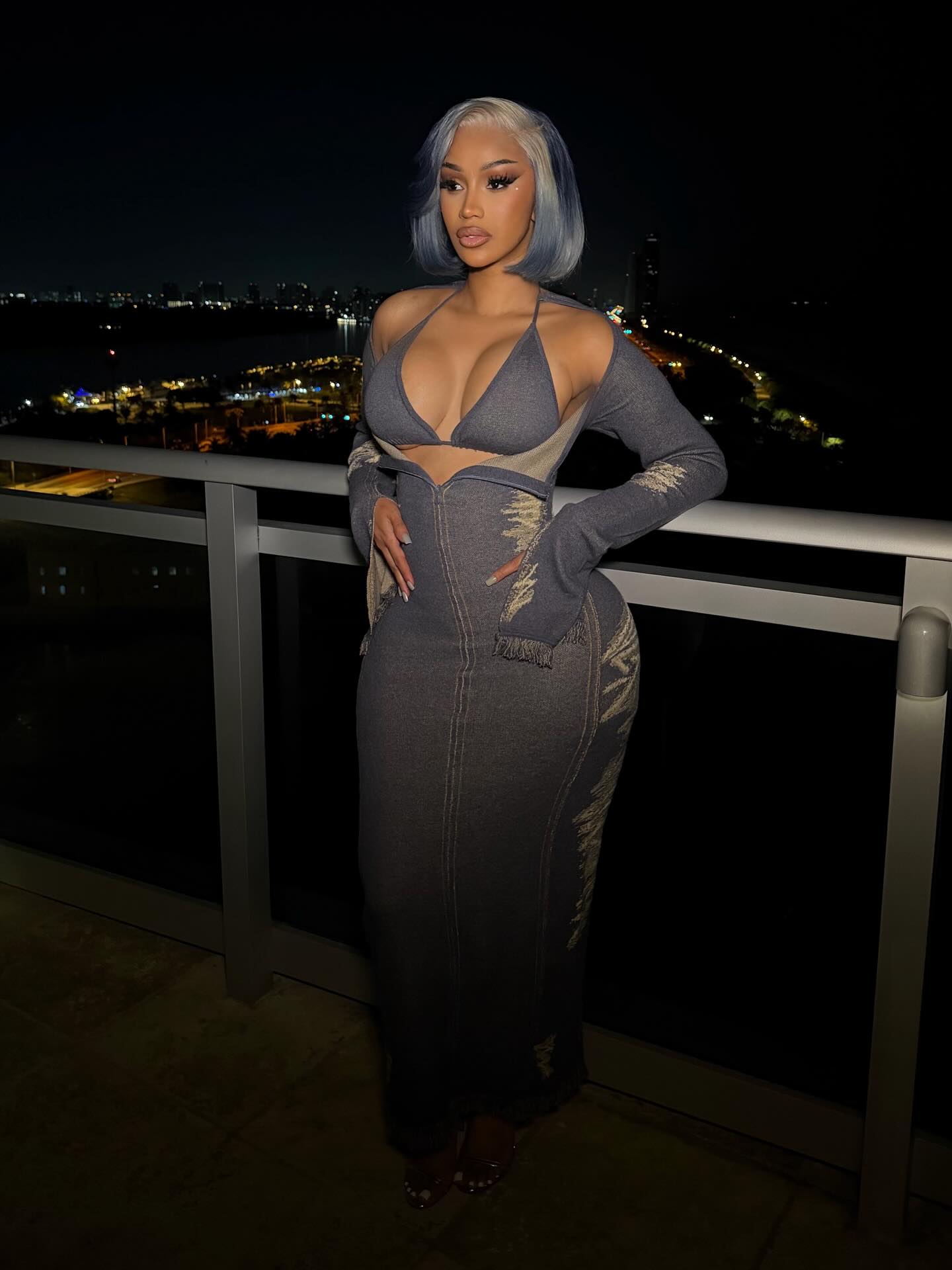 Rapper Cardi B matched her hair to her dress, tailored perfectly to her body, in Miami for Art Basel.