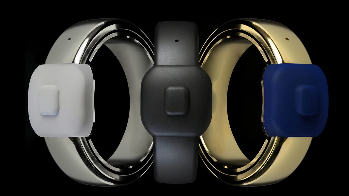 Three metal rings with silicone buttons on them: Pebble Index 01 smart ring