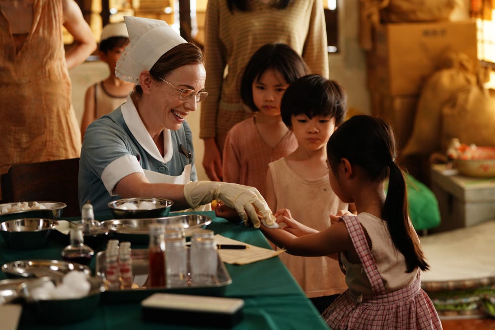 laura main as nurse shelagh tending to children in the call the midwife christmas special 2025