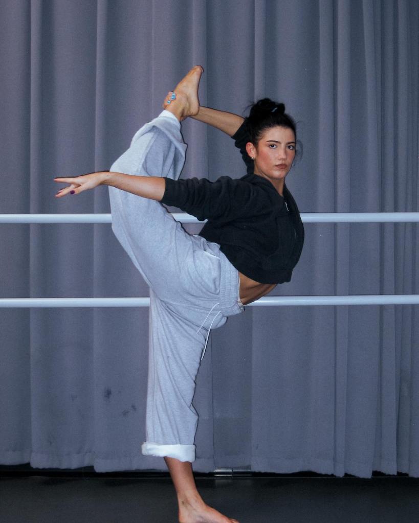 Dancer and influencer Charli D’Amelio, all bent into shapes, can’t be dragged away from the barre.