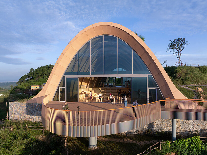 MVRDV perches arched, earth-covered timber pavilion among the hills of chengdu, china