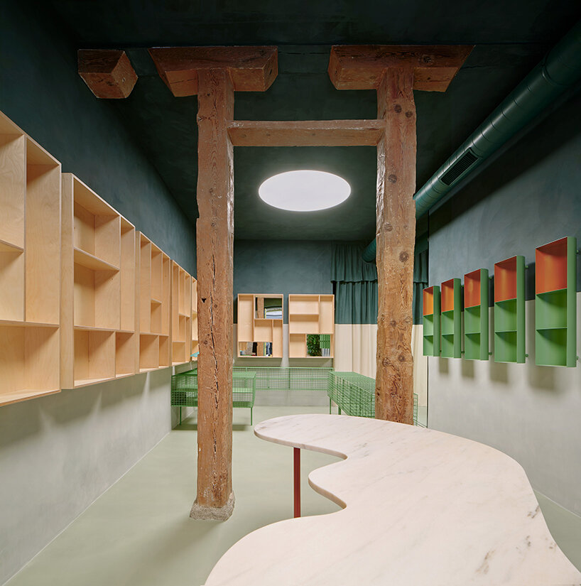organic marble tables and vibrant hues complete madrid store by lucas y hernández-gil