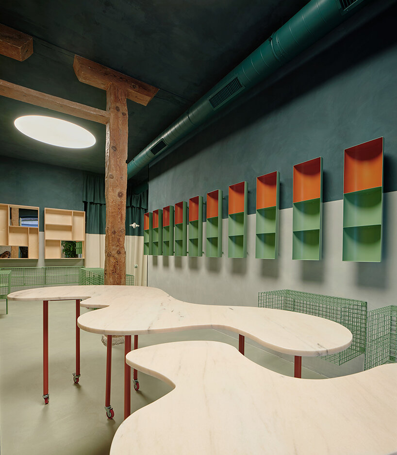 organic marble tables and vibrant hues complete madrid store by lucas y hernández-gil