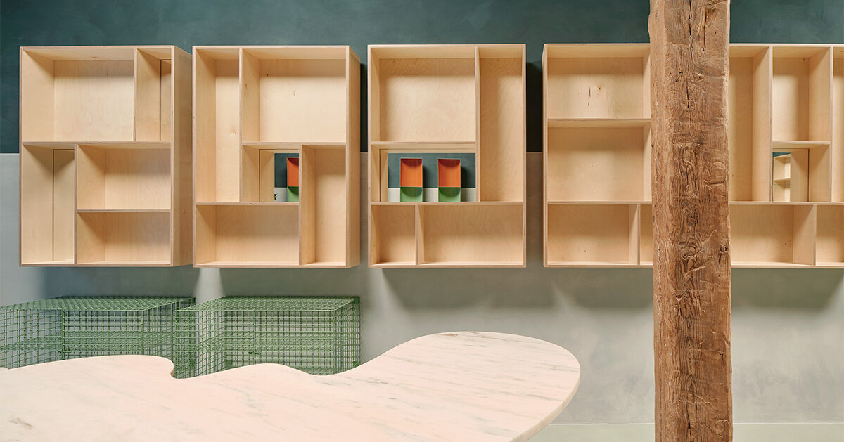 lucas y hernández-gil adds organic marble tables to madrid store