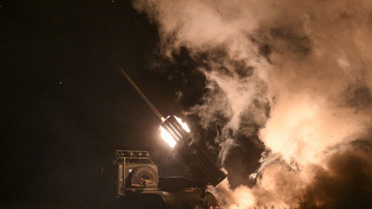 Service members of the 152nd Jaeger Brigade fire a BM-21 Grad multiple rocket launch system. Pic: Reuters
