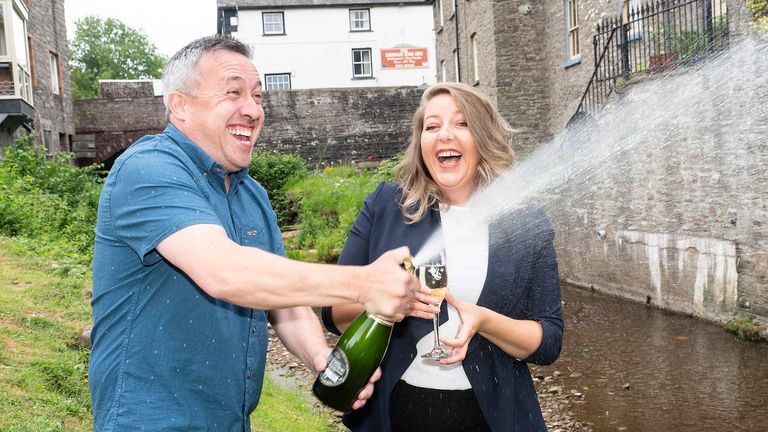 Deja vu as the couple celebrate with some fizz. Pics: Allwyn