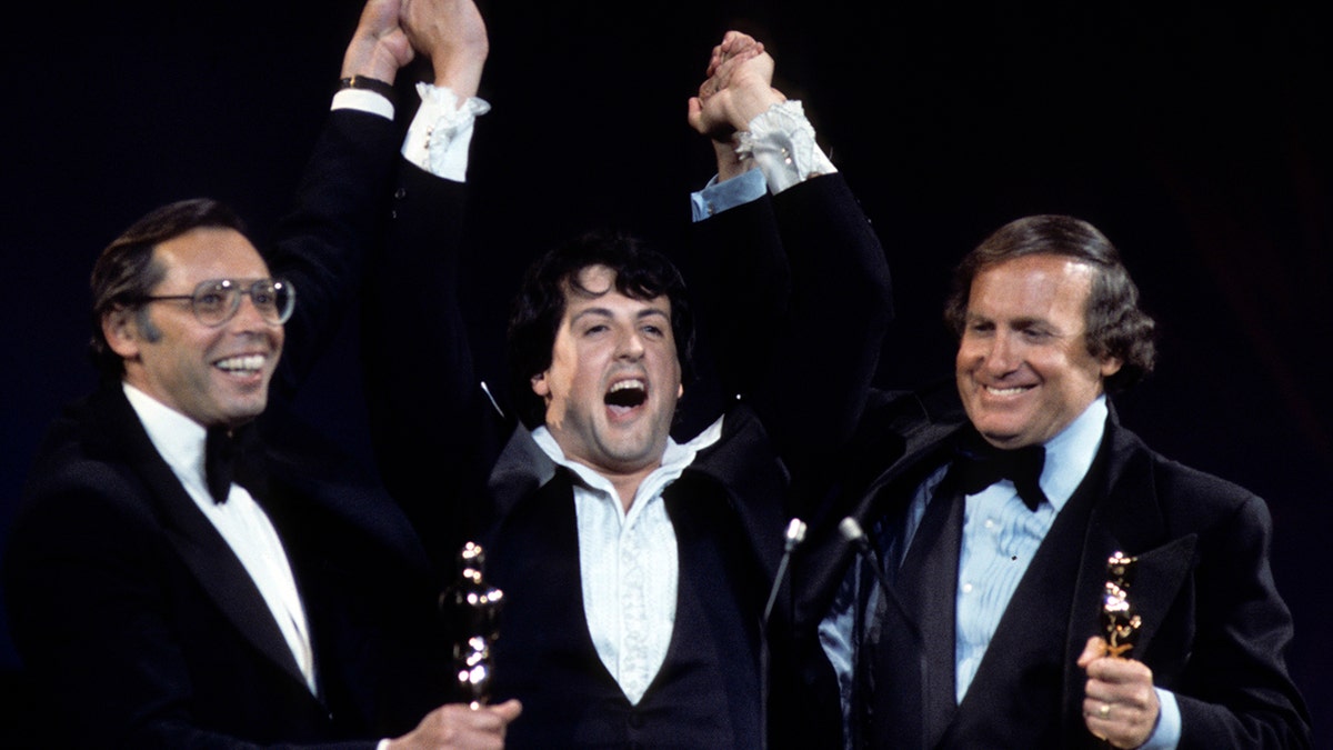 Sylvester Stallone accepting the award for best picture in 1977.