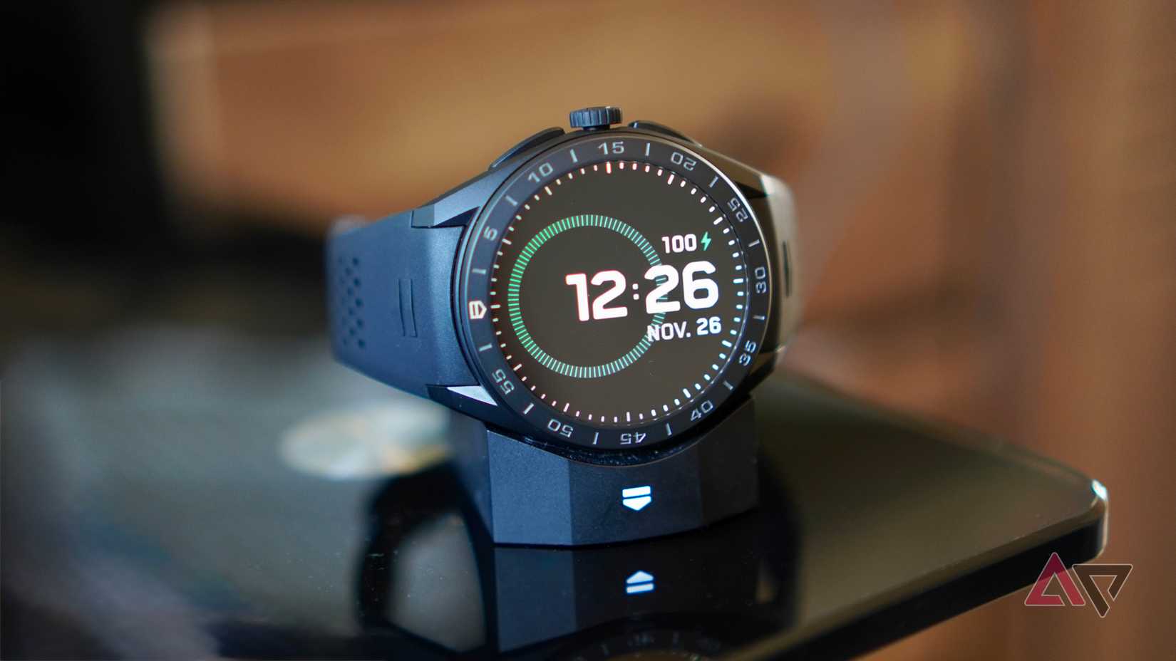 The Tag Heuer Connected Calibre E5 on its charger