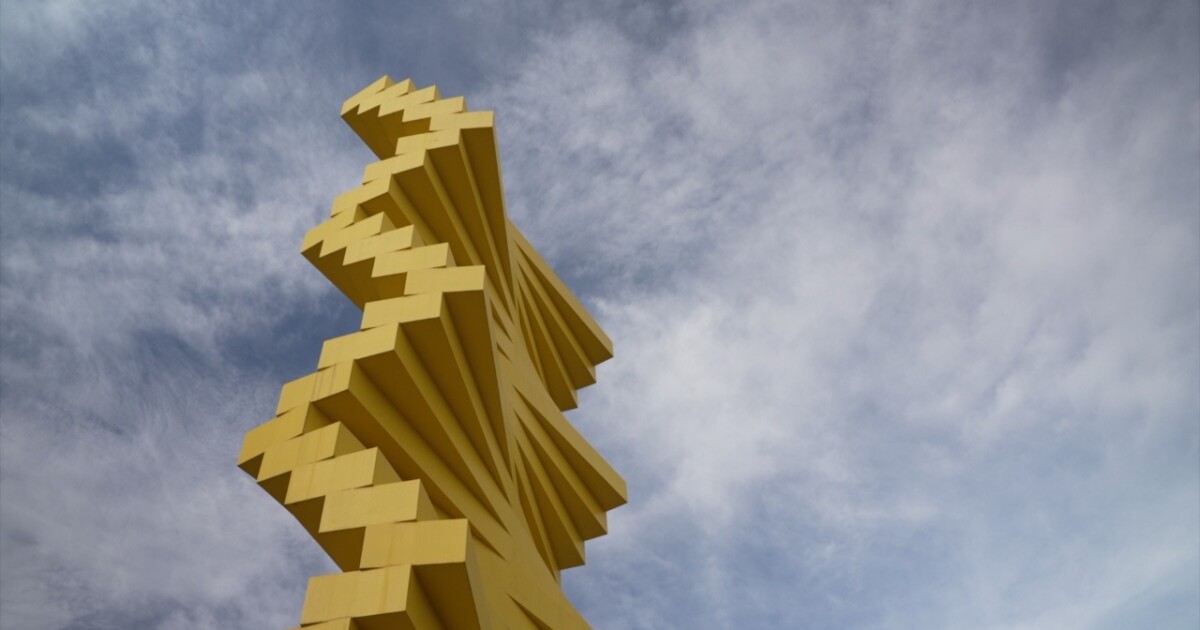 The giant, yellow sculpture at the Denver Design District