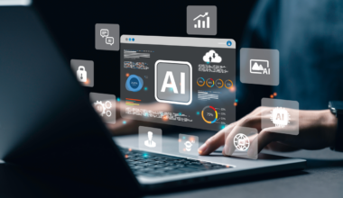 Digital icon labeled AI is projected above a laptop as a person uses the device.