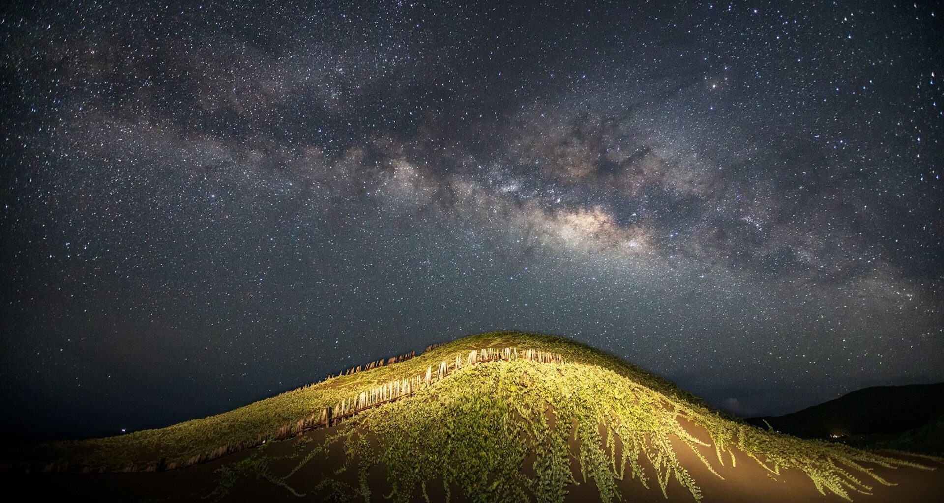 Shot with an old Canon 5D Mark III DSLR, this photo captures an astonishing Milky Way arc over a Mount Fuji-inspired landscape