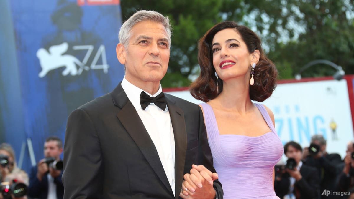 George Clooney, his wife Amal and children become French