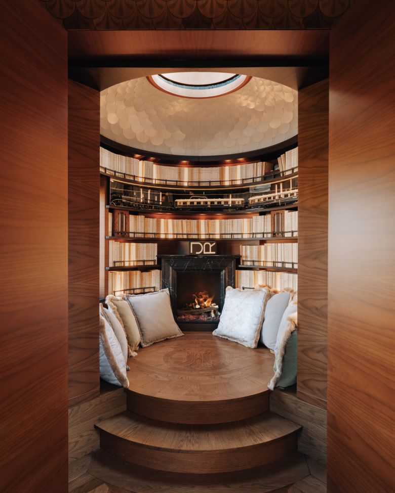The library features a domed roof, skylight and electric fireplace.
