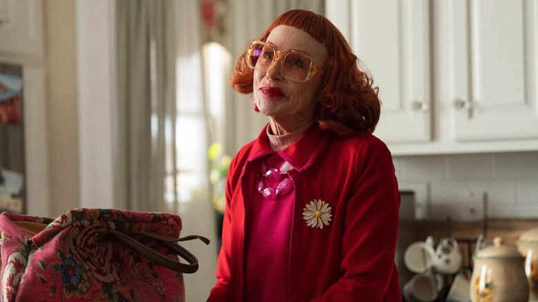 Amy Madigan as Gladys, smiling in a kitchen in Weapons