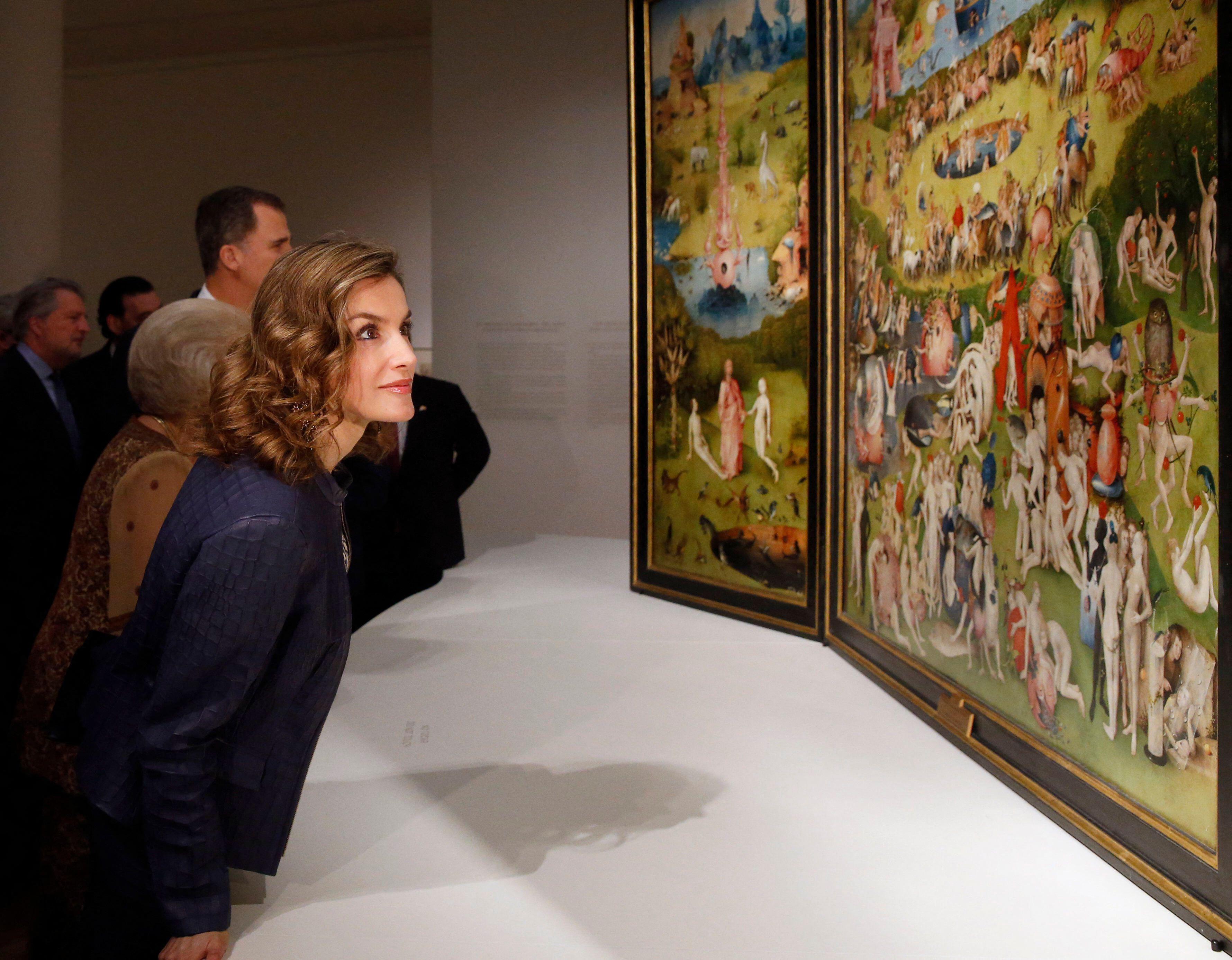 Queen Letizia of Spain viewing a Hieronymus Bosch exhibition at El Prado Museum.