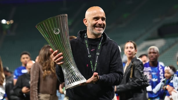 WROCLAW, POLAND - MAY 28: Enzo Maresca manager / head coach of Chelsea celebrates with the trophy after winning the UEFA Conference League Final 2025 between Real Betis Balompie and Chelsea FC at Wrocaw Stadium on May 28, 2025 in Wroclaw, Poland. (Photo by Robbie Jay Barratt - AMA/Getty Images)