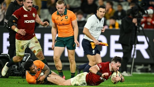 26 July 2025; Hugo Keenan of British & Irish Lions scores his side's fifth try during the second test match between Australia and the British & Irish Lions at the Melbourne Cricket Ground in Melbourne, Australia. Photo by Brendan Moran/Sportsfile