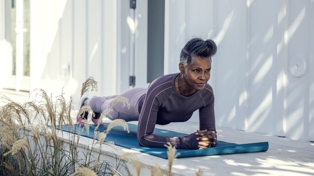 older lady doing yoga