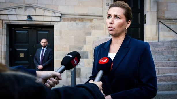 Danish Prime Minister Mette Frederiksen speaks to reporters