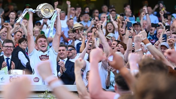 12 July 2025; Kildare captain Kevin Feely lifts the cup after his side's victory in the Tailteann Cup final match between Kildare and Limerick at Croke Park in Dublin. Photo by Seb Daly/Sportsfile