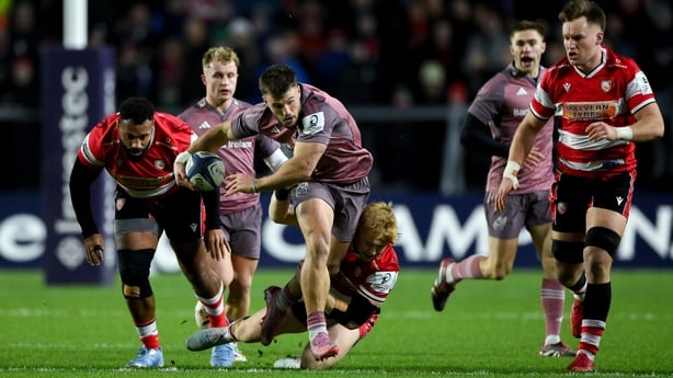 13 December 2025; Alex Nankivell of Munster is tackled by Max Knight of Gloucester during the Investec Champions Cup match between Munster and Gloucester at SuperValu Páirc Ui Chaoimh in Cork. Photo by Brendan Moran/Sportsfile