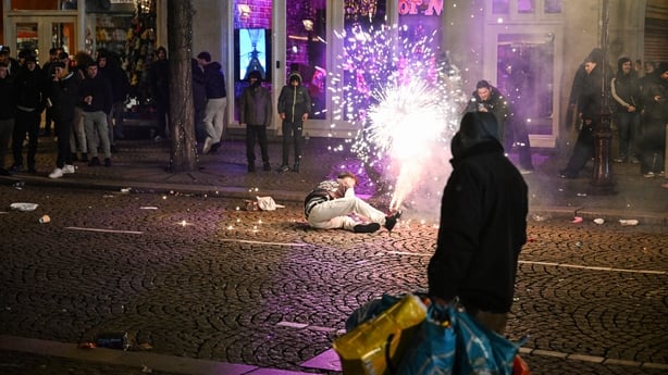 Police intervene during New Year's Eve celebrations at Dam Square amsterdam