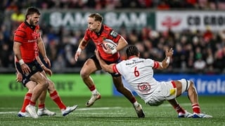 2 January 2026; Mike Haley of Munster is tackled by Cormac Izuchukwu of Ulster during the United Rugby Championship match between Ulster and Munster at Affidea Stadium in Belfast. Photo by Ramsey Cardy/Sportsfile