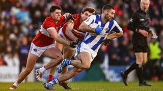 Shane Clayton of Ballyboden St Enda's in action against Dylan Geaney, left, and Conor Geaney of Dingle during the AIB GAA Football All-Ireland Senior Club Championship semi-final match between Dingle of Kerry and Ballyboden St Enda's of Dublin at SuperVal