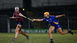 Lisa Casserly of Athenry is tackled by Sofia Daly of St Finbarr’s during the AIB All-Ireland Camogie Senior Club Championship final replay match between Athenry of Galway and St Finbarr's of Cork at FBD Semple Stadium in Thurles, Tipperary. Photo by Ben M