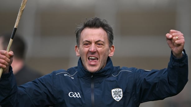 26 October 2024; Kevin O'Brien celebrates a score for Ireland, late in the game, during the Shinty International match between Ireland and Scotland at Cusack Park in Ennis, Clare. Photo by Ray McManus/Sportsfile 